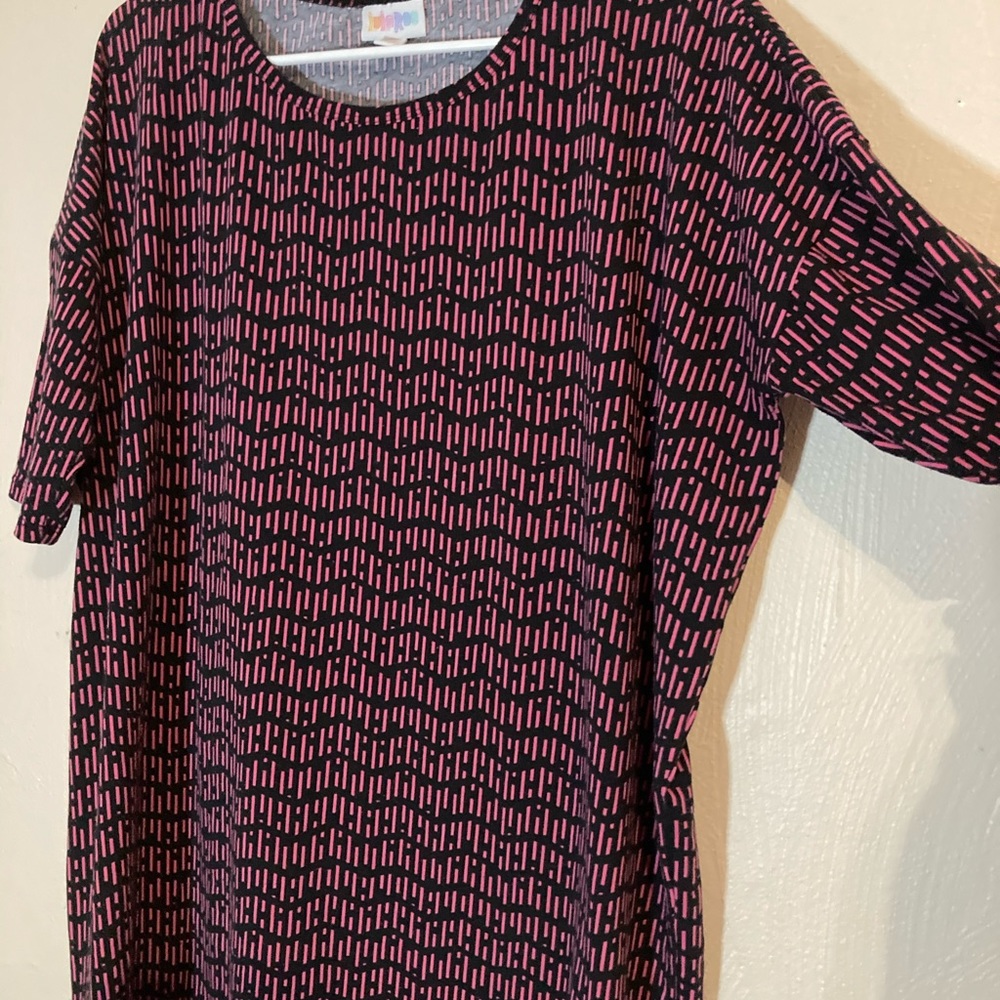 Longer pink and black shirt